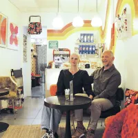 Val et Jean-Christophe dans leur boutique  DR